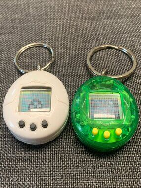 Pair of Vintage Bandai Tamagotchi Mini Virtual Pet Devices